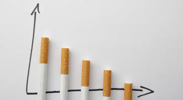 Graphique montrant la diminution de la consommation de cigarettes, symbolisant le sevrage nicotine combien de temps.
